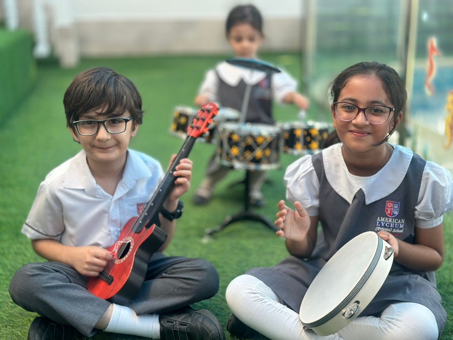 Pupils enjoying a music lesson