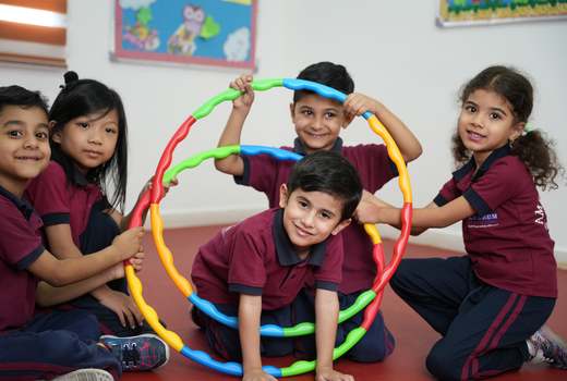 Children building leadership through teamwork at American Lyceum Muscat